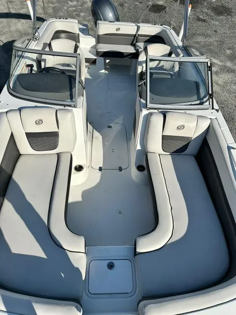 Slide: The Image of 2018 Godfrey Hurricane 217SD boat interior with spacious seating and modern design. - 12