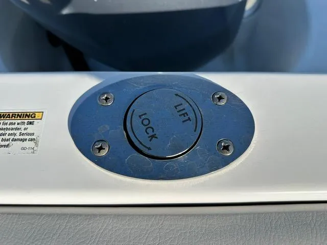 Slide: The Image of Close-up of a 2018 Godfrey Hurricane 217SD boat lift-lock mechanism. - 14