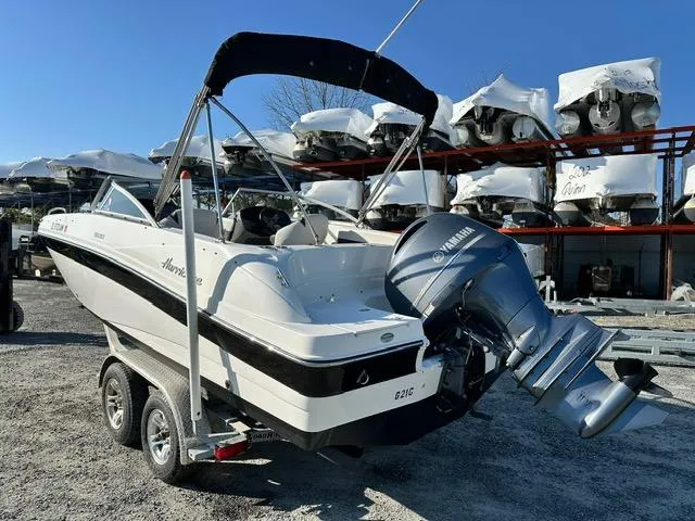 Slide: The Image of 2018 Godfrey Hurricane 217SD boat on trailer with Yamaha outboard motor. - 2