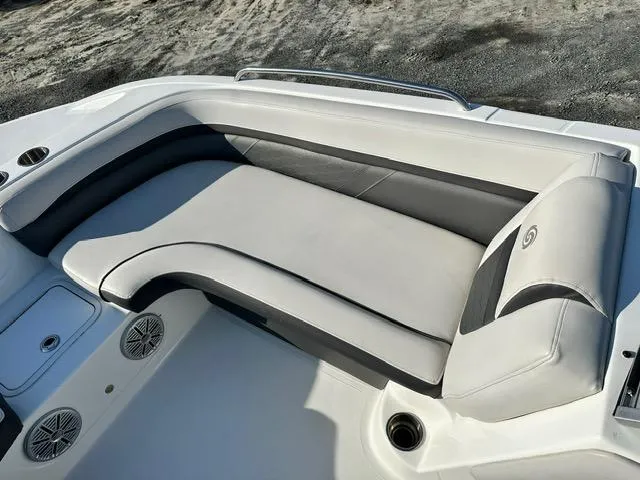 Slide: The Image of 2018 Godfrey Hurricane 217SD boat interior with cushioned seating and cup holders. - 7