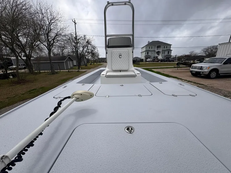 Slide: The Image of 2019 Catalyst 260 Catamaran boat deck with overcast sky background. - 10