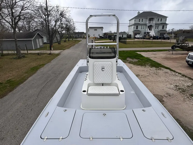 Slide: The Image of 2019 Catalyst 260 Catamaran on trailer, residential street background. - 8