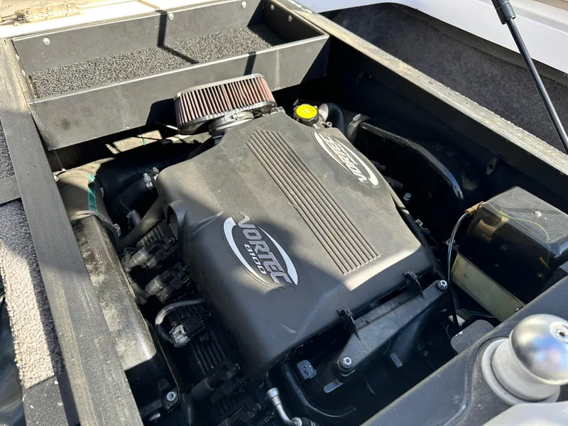 Slide: The Image of 2008 Supra Launch 24 SSV GG Edition engine compartment, showcasing powerful Vortec engine. - 11