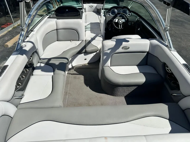 Slide: The Image of 2008 Supra Launch 24 SSV GG Edition boat interior with gray and white seating. - 7