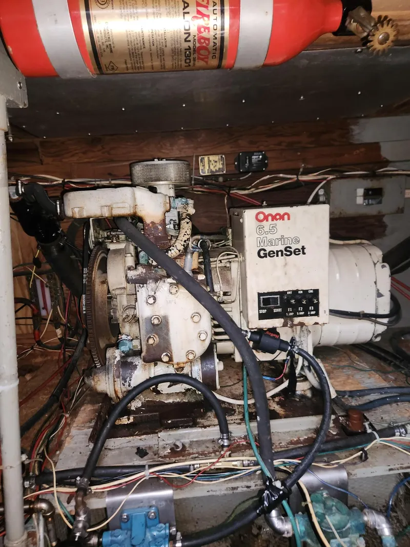 Slide: The Image of Engine room of a 1977 Pacemaker 40 Sportfisherman with Onan Marine GenSet. - 25