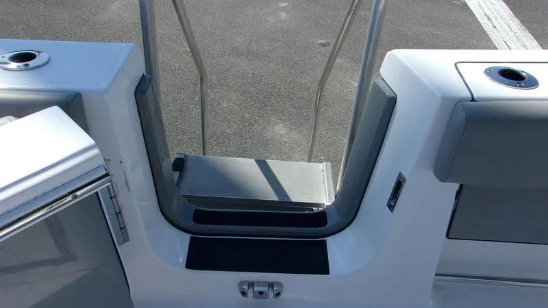 Slide: The Image of 2025 Sportsman Open 302 boat interior, featuring a sleek entryway and modern design elements. - 15