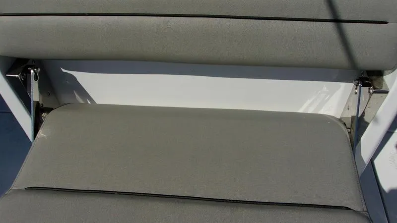 Slide: The Image of 2025 Sportsman Open 302 boat seat with gray upholstery. - 8