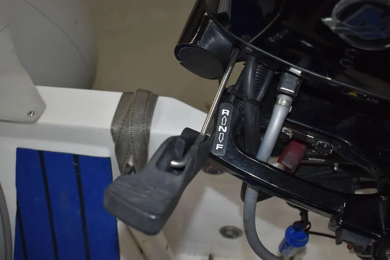 Slide: The Image of Close-up of a 2018 Mercury 460 Ocean Runner Rib Inflatable boat control lever. - 17