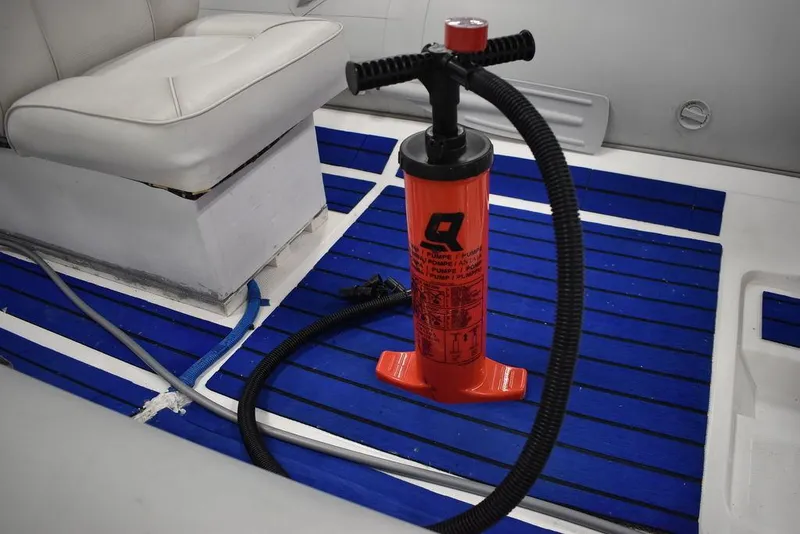 Slide: The Image of Red pump on blue floor of 2018 Mercury 460 Ocean Runner Rib Inflatable boat. - 20