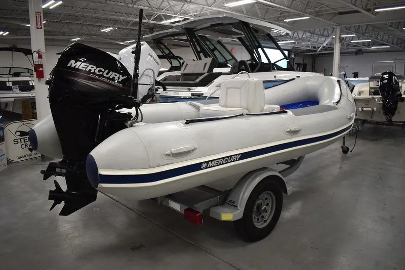 Slide: The Image of 2018 Mercury 460 Ocean Runner Rib Inflatable boat in showroom, on trailer. - 25