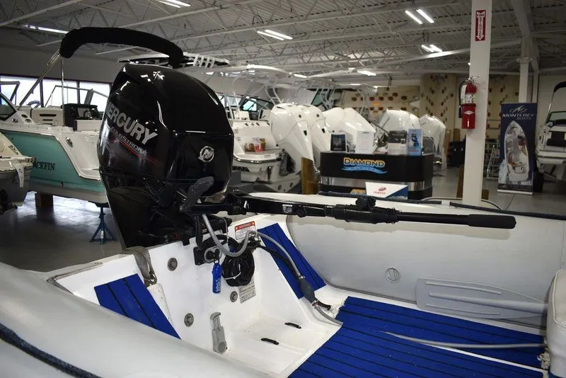 Slide: The Image of 2018 Mercury 460 Ocean Runner Rib Inflatable boat with outboard motor in showroom. - 6