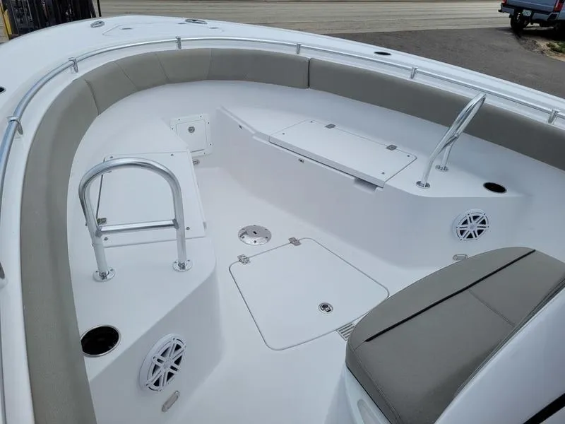 Slide: The Image of 2025 Sportsman Open 232 boat interior with seating and storage compartments. - 8