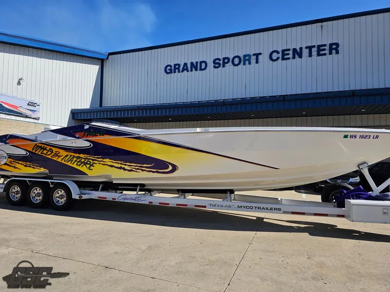 Slide: The Image of 2003 Cigarette 42 Tiger boat on trailer at Grand Sport Center. - 12