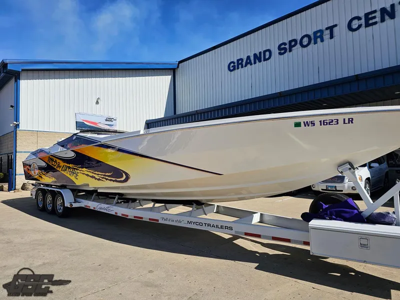 Slide: The Image of 2003 Cigarette 42 Tiger powerboat on trailer at Grand Sport Center. - 14