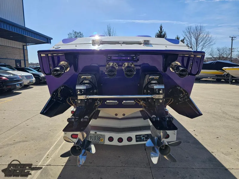 Slide: The Image of Rear view of a 2003 Cigarette 42 Tiger boat with dual engines. - 40