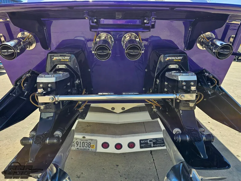 Slide: The Image of Rear view of a 2003 Cigarette 42 Tiger boat with Mercury engines. - 41