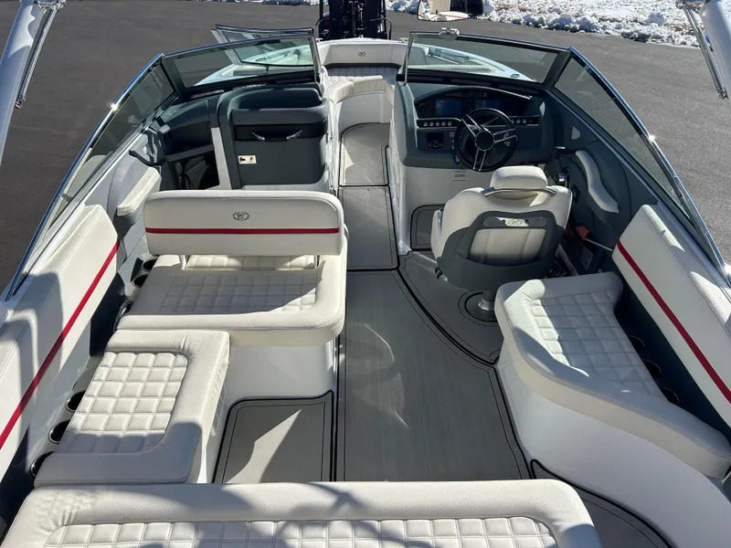 Slide: The Image of 2020 Cobalt R5 Surf boat interior with luxurious seating and modern dashboard. - 11