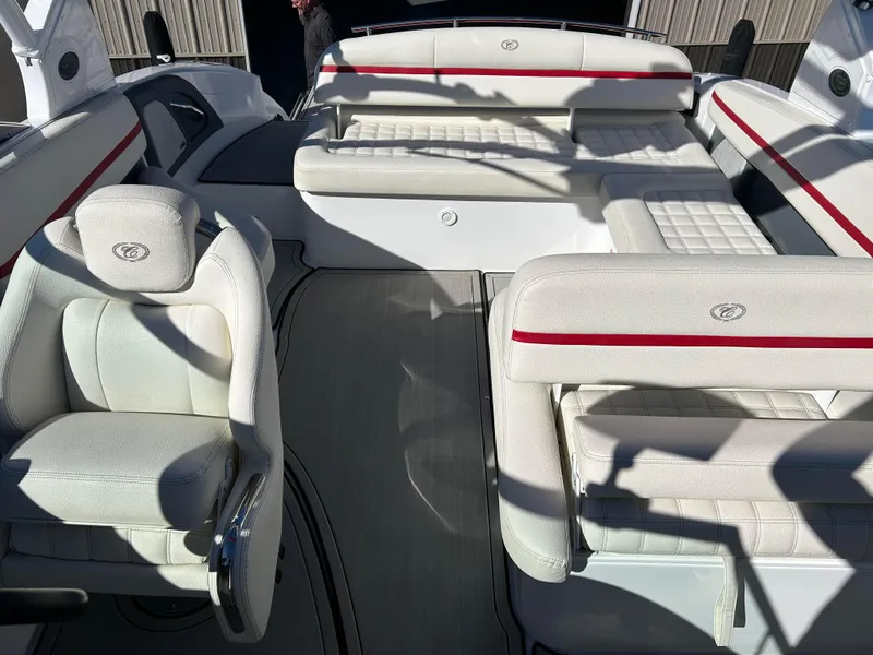 Slide: The Image of 2020 Cobalt R5 Surf boat interior with white seating and red accents. - 14