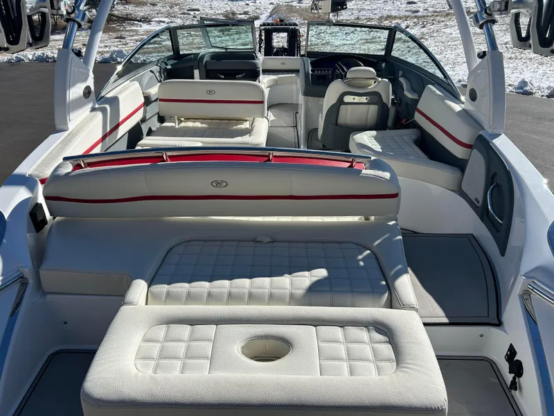 Slide: The Image of 2020 Cobalt R5 Surf boat interior with white and red seating, spacious layout. - 8