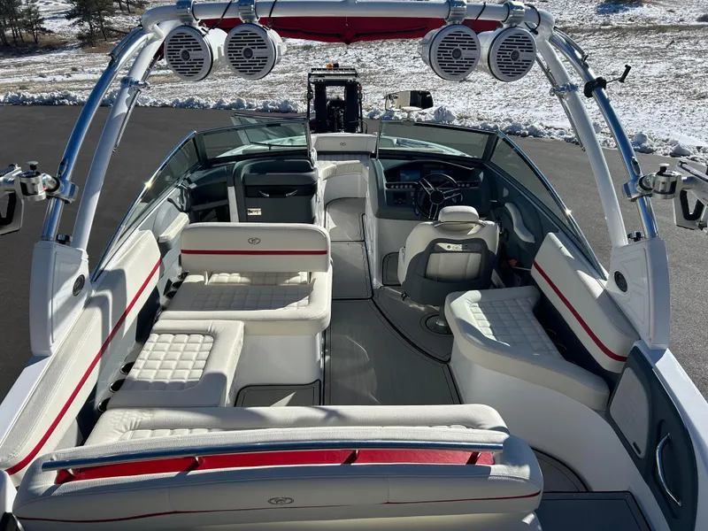 Slide: The Image of 2020 Cobalt R5 Surf boat interior with white seating and modern design. - 9