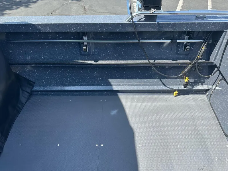 Slide: The Image of Interior view of a 2025 Duckworth 20 Advantage boat, showcasing the deck and wiring. - 10