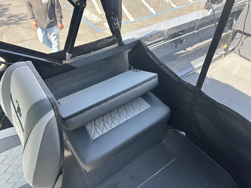 Slide: The Image of Interior of 2025 Duckworth 20 Advantage boat with gray seating and diamond-patterned upholstery. - 11