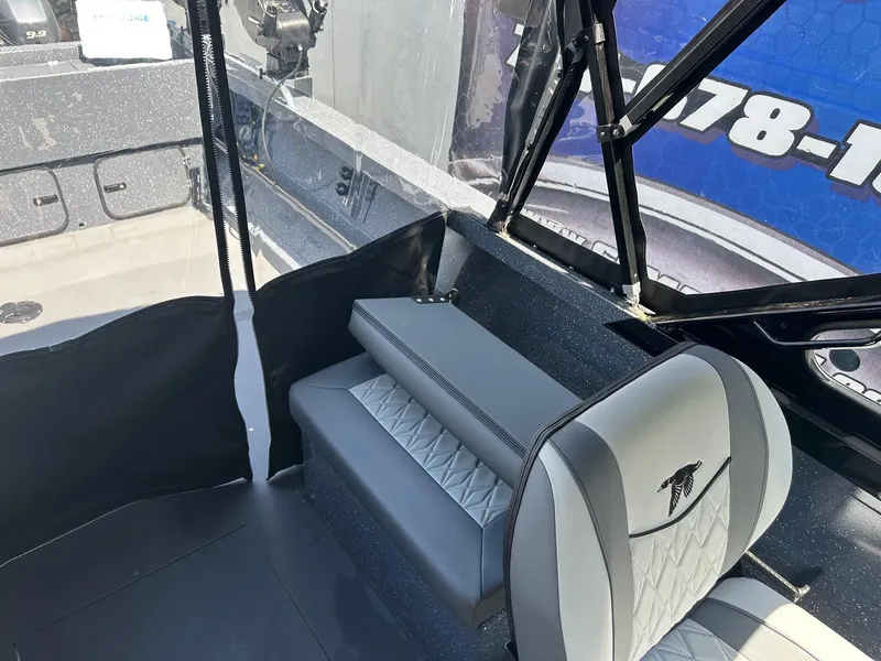 Slide: The Image of Interior of 2025 Duckworth 20 Advantage boat with gray seating and modern design. - 12