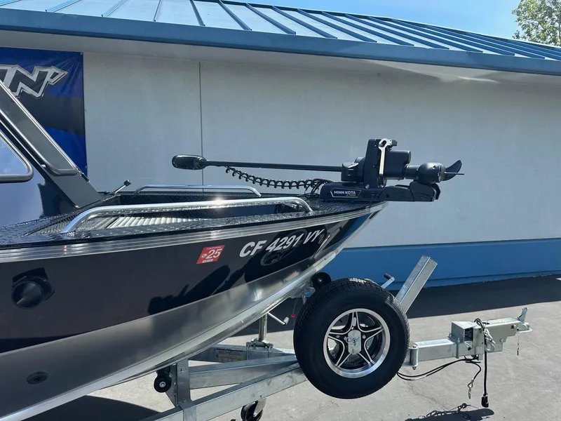 Slide: The Image of 2025 Duckworth 20 Advantage boat on trailer, featuring a mounted trolling motor. - 4