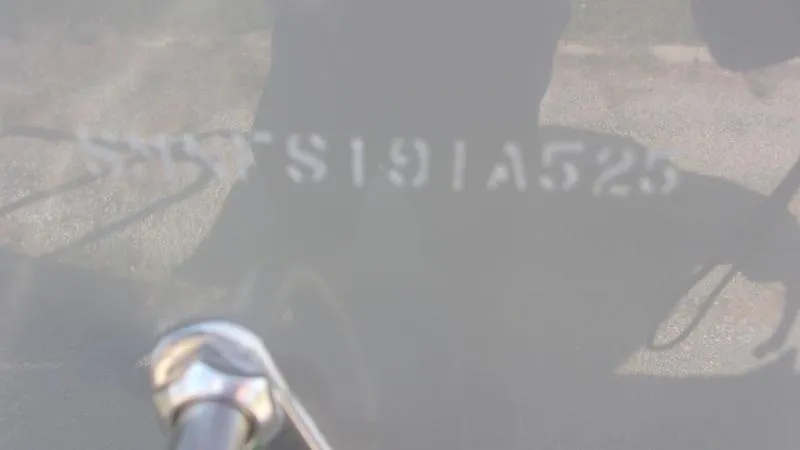 Slide: The Image of 2025 Sportsman Open 232 boat hull identification number close-up. - 1