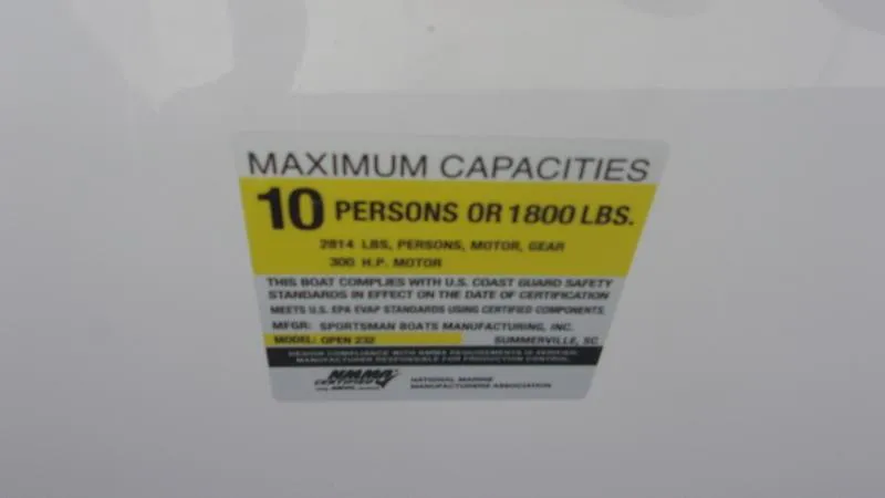 Slide: The Image of 2025 Sportsman Open 232 capacity label: 10 persons or 1800 lbs, U.S. Coast Guard compliant. - 10