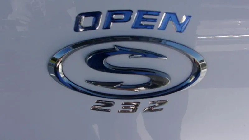 Slide: The Image of 2025 Sportsman Open 232 logo emblem on a white surface. - 16
