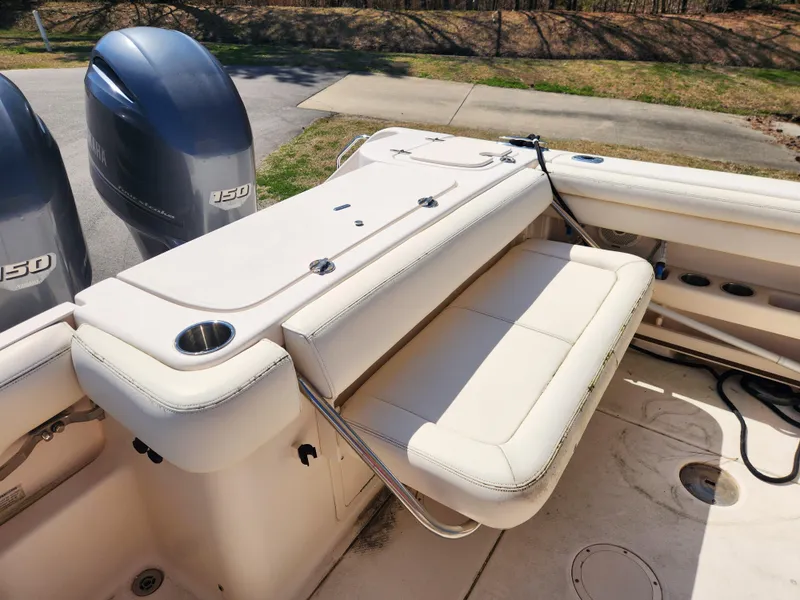 Slide: The Image of 2015 Grady-White Freedom 275 boat with dual engines and foldable seating. - 15