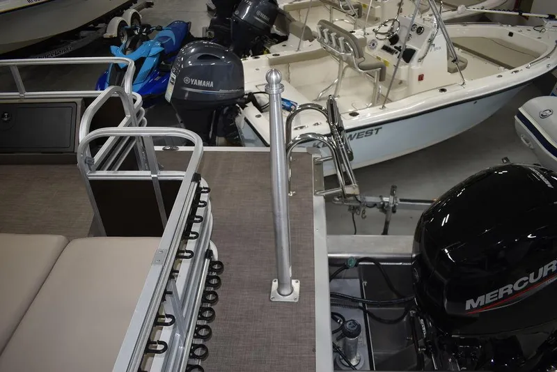 Slide: The Image of 2023 Sun Tracker Sportfish™ 24 XP3 pontoon boat with Mercury and Yamaha outboard motors. - 14