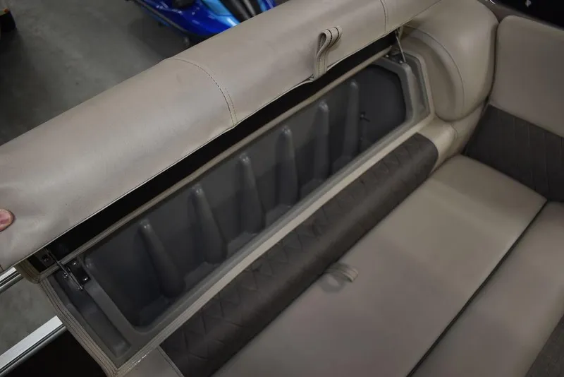 Slide: The Image of 2023 Sun Tracker Sportfish™ 24 XP3 boat seat storage compartment open. - 41