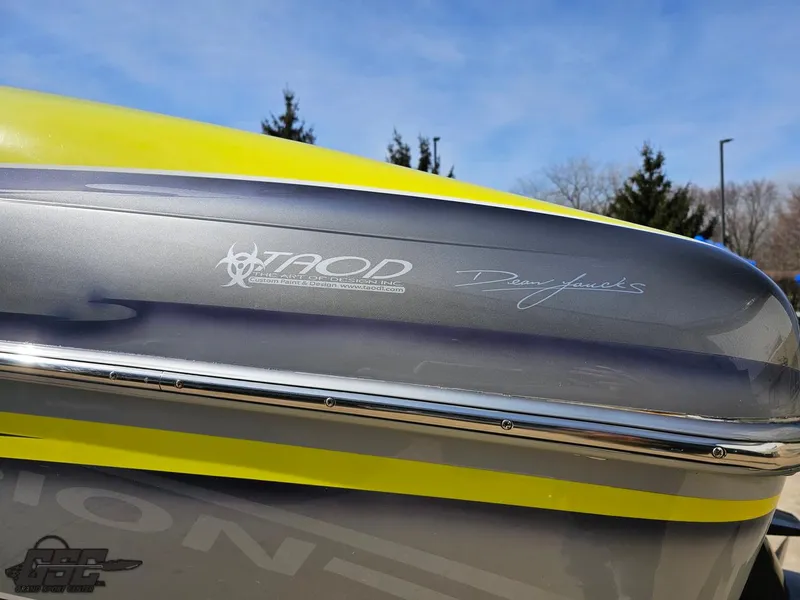 Slide: The Image of 2007 Outerlimits 39 Quattro boat with TAOD design, featuring sleek gray and yellow detailing. - 21