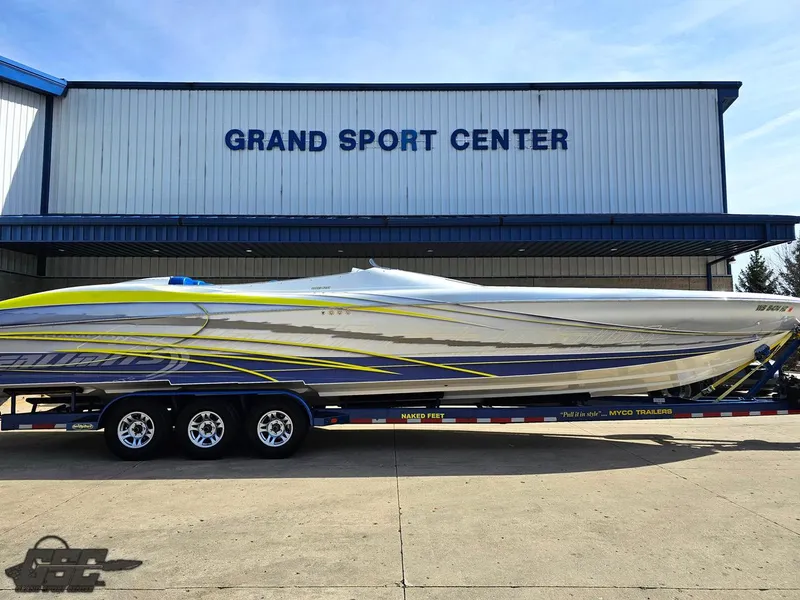 Slide: The Image of 2007 Outerlimits 39 Quattro boat on trailer at Grand Sport Center. - 3