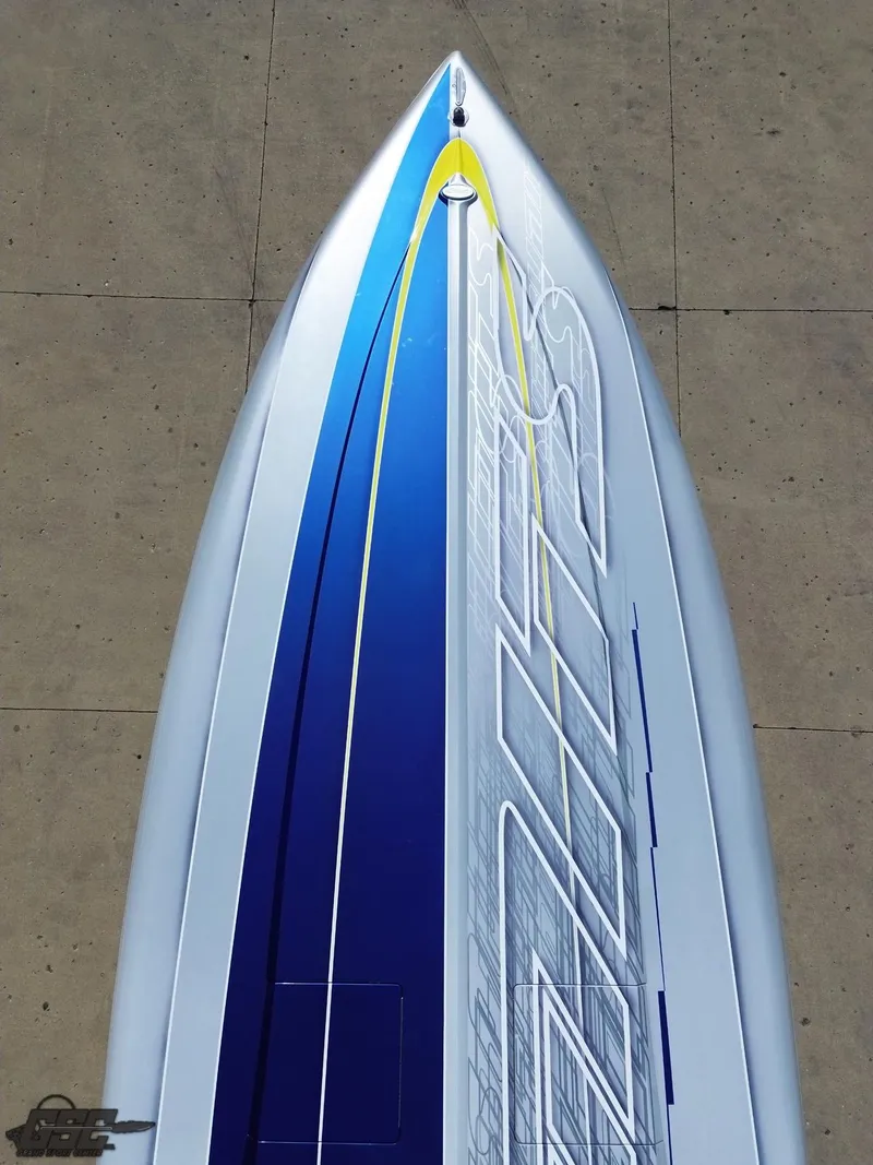 Slide: The Image of Top view of a 2007 Outerlimits 39 Quattro boat with sleek blue and white design. - 37