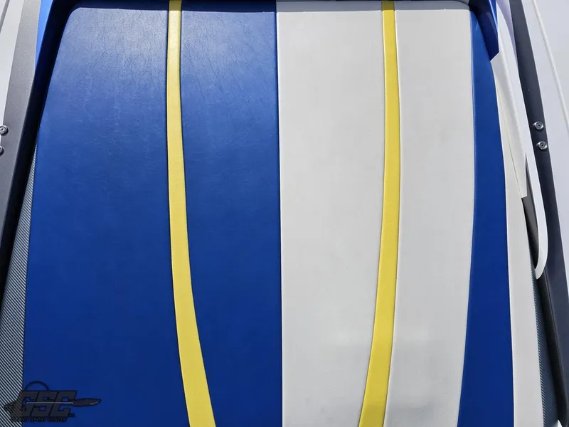 Slide: The Image of 2007 Outerlimits 39 Quattro boat seat with blue, white, and yellow stripes. - 47