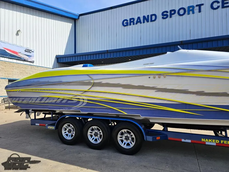 Slide: The Image of 2007 Outerlimits 39 Quattro boat on trailer at Grand Sport Center. - 6