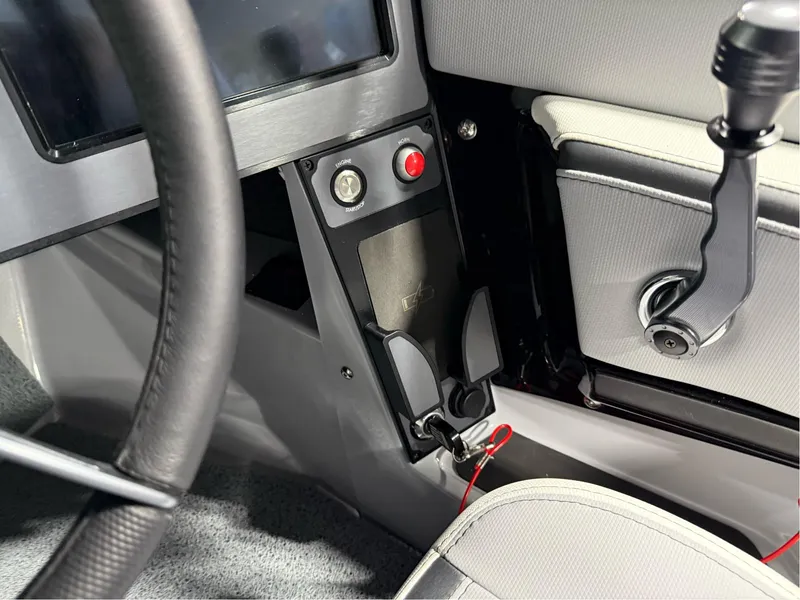 Slide: The Image of 2025 MasterCraft ProStar interior dashboard with controls and steering wheel detail. - 18