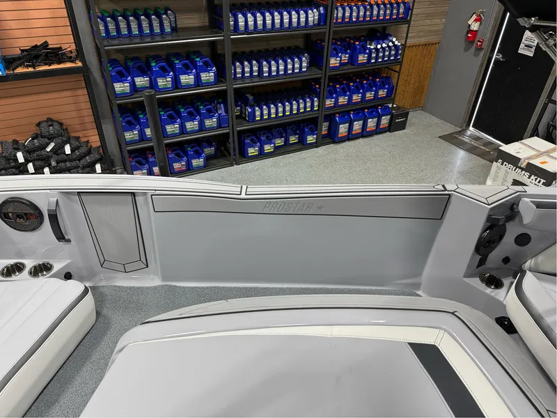 Slide: The Image of 2025 MasterCraft ProStar interior with storage shelves and maintenance supplies in the background. - 26
