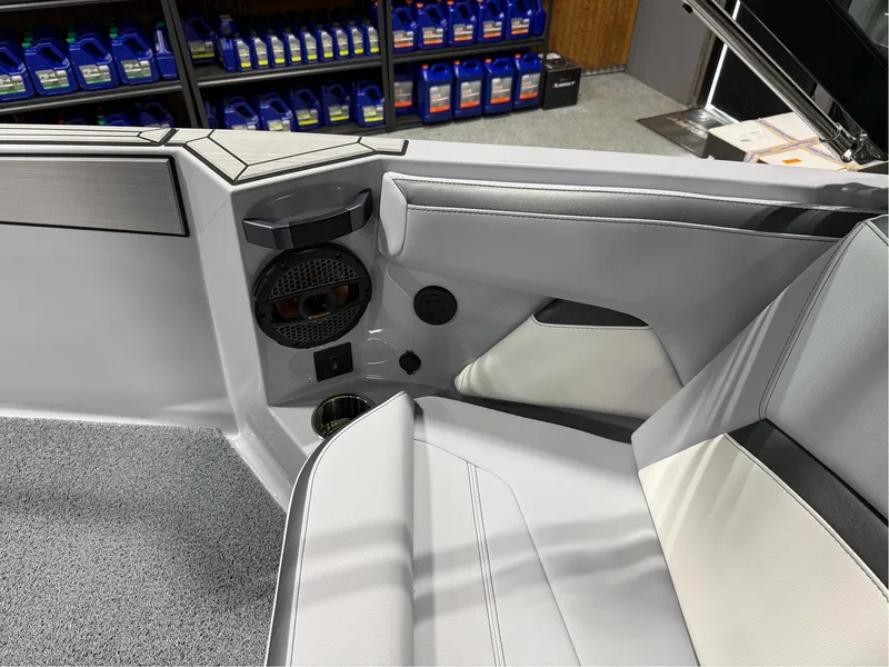 Slide: The Image of Interior of 2025 MasterCraft ProStar boat with modern seating and speaker system. - 28