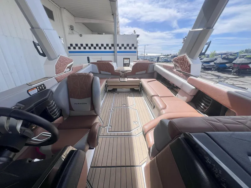 Slide: The Image of 2022 Nautique Super Air Nautique G25 Paragon interior with luxurious seating and modern design. - 14