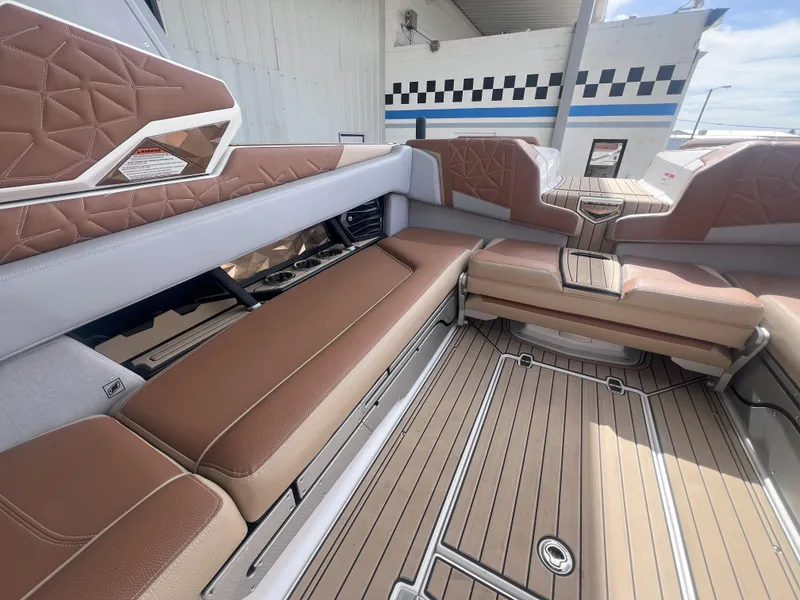 Slide: The Image of 2022 Nautique Super Air Nautique G25 Paragon interior with luxurious seating and modern design. - 17