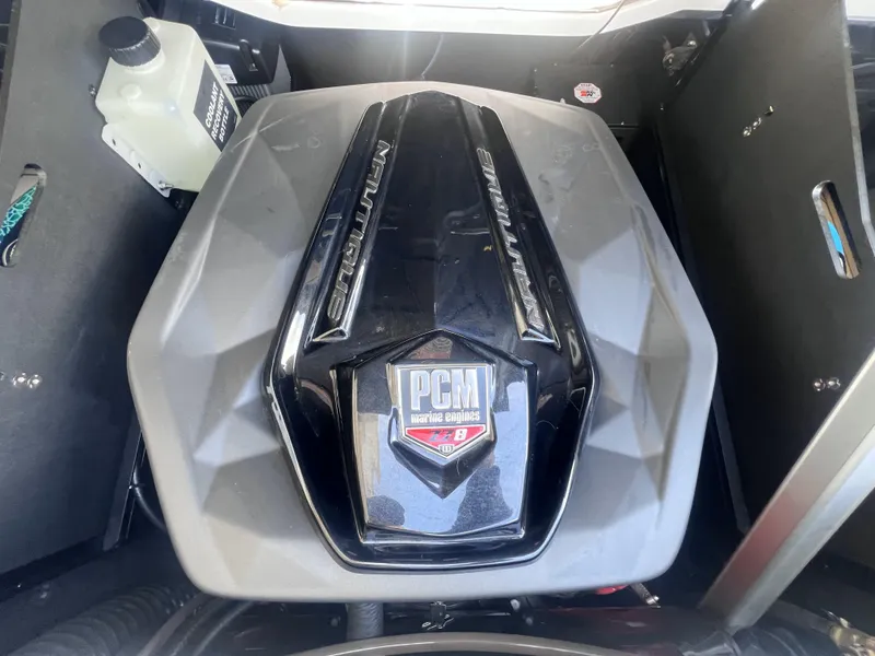 Slide: The Image of 2022 Nautique Super Air Nautique G25 Paragon engine compartment with PCM marine engine. - 18