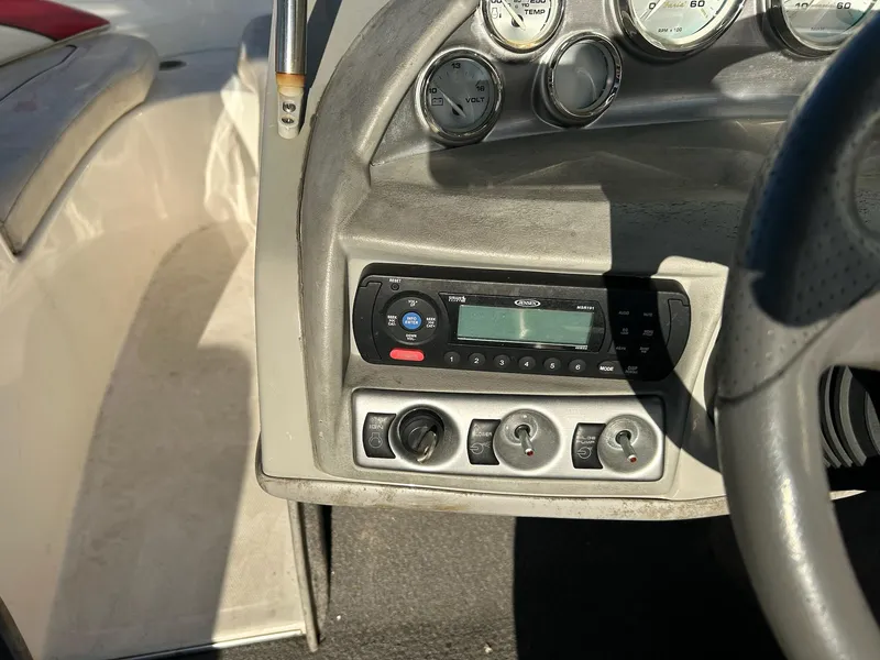 Slide: The Image of Dashboard of 2012 Bayliner 185 Bowrider with gauges and controls. - 7
