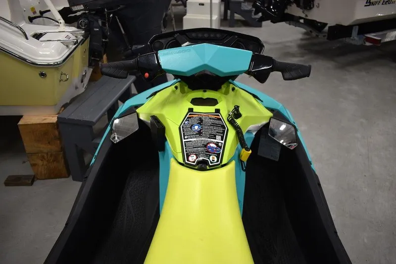 Slide: The Image of 2022 Sea-Doo Spark® 3-up Rotax® 900 ACE™ dashboard with audio controls, vibrant colors. - 10