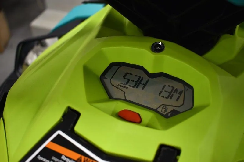 Slide: The Image of 2022 Sea-Doo Spark® dashboard display, showing digital readout and controls. - 14