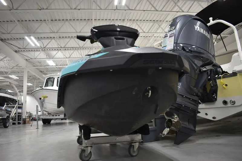 Slide: The Image of 2022 Sea-Doo Spark 3-up Rotax 900 ACE in showroom, front view. - 30