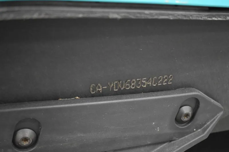 Slide: The Image of Close-up of 2022 Sea-Doo Spark® 3-up Rotax® 900 ACE™ hull identification number. - 34